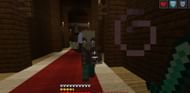 A Vindicator attacks the player with an axe (Image via Mojang)